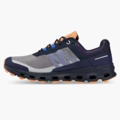 On Running Women's Cloudvista Trail Shoe - Midnight/Copper- Regular (B) 11 On Running Women's Cloudvista Trail Shoe - Midnight/Copper- Regular (B) -Sports Shoe Store 64.98592 cloudvista fw22 midnight copper w g4