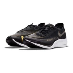 Nike Women's ZoomX Vaporfly Next % 2 Racing Shoe - Black/White/Metallic Gold Coin - Regular (B) 13 Nike Women's ZoomX Vaporfly Next % 2 Racing Shoe - Black/White/Metallic Gold Coin - Regular (B) -Sports Shoe Store CU4123 001 PHCFH001 1500