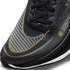 Nike Women's ZoomX Vaporfly Next % 2 Racing Shoe - Black/White/Metallic Gold Coin - Regular (B) 16 Nike Women's ZoomX Vaporfly Next % 2 Racing Shoe - Black/White/Metallic Gold Coin - Regular (B) -Sports Shoe Store CU4123 001 PHSYD001 1500