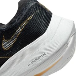 Nike Women's ZoomX Vaporfly Next % 2 Racing Shoe - Black/White/Metallic Gold Coin - Regular (B) 17 Nike Women's ZoomX Vaporfly Next % 2 Racing Shoe - Black/White/Metallic Gold Coin - Regular (B) -Sports Shoe Store CU4123 001 PHSYD002 1500